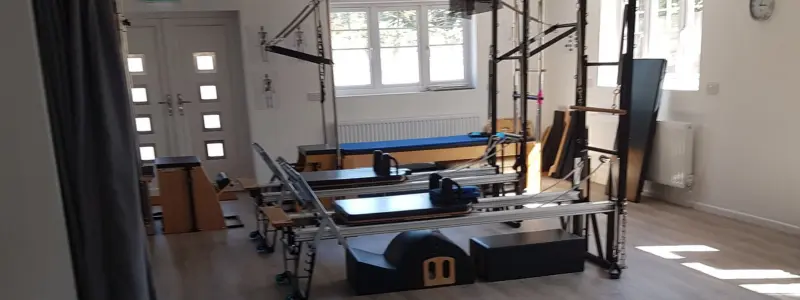 Full Pilates studio with various equipment. Offering Pilates Reformer Classes in Broadstone, Dorset